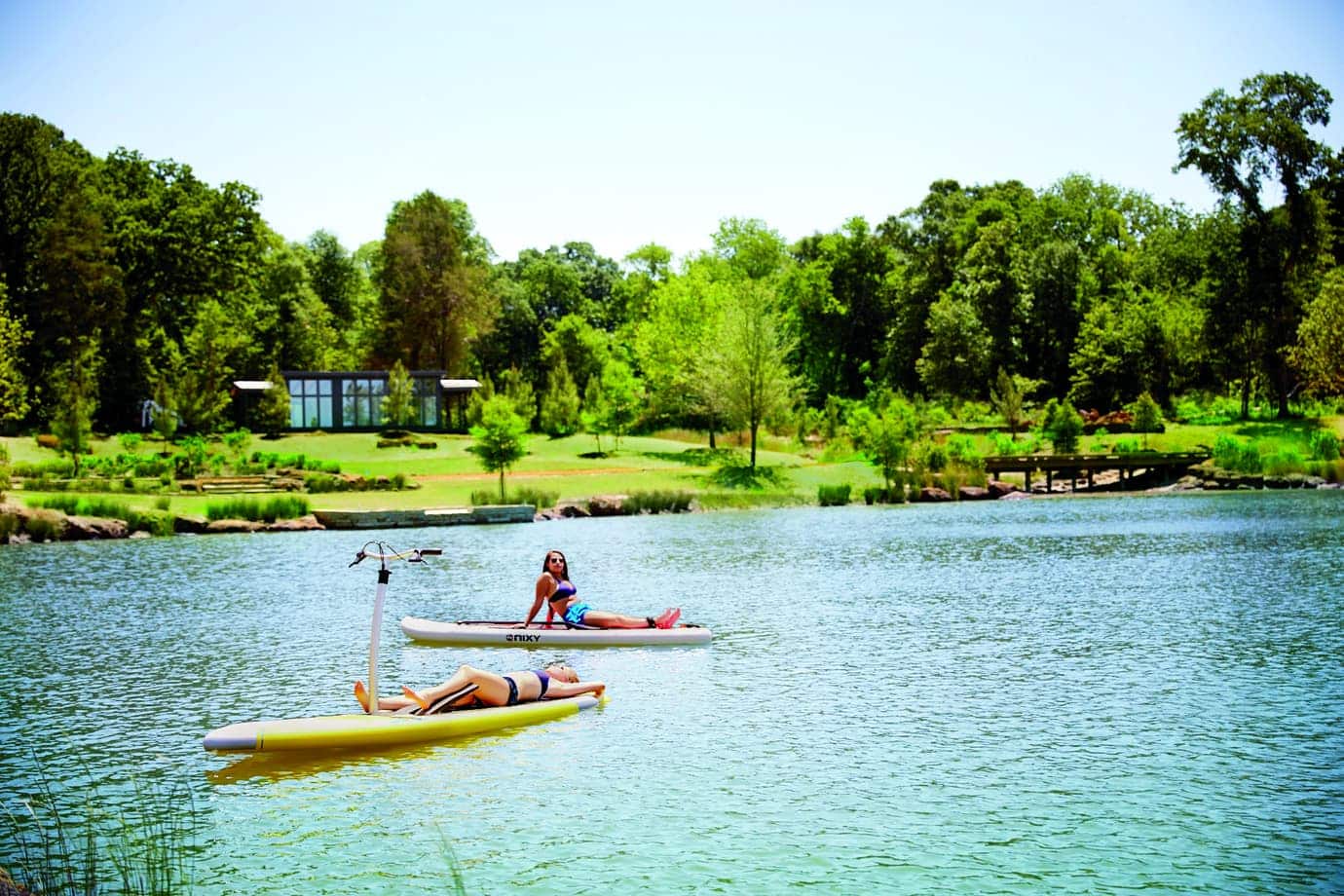 Many great ways to play at Long Cove like these women relaxing while they tan on the lake