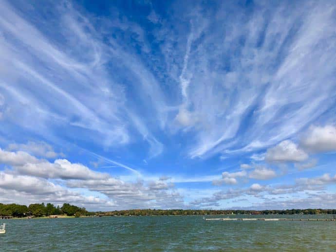 Clear blue skies over cedar creek lake at long cove