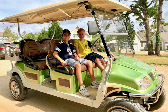 Kids enjoying a gold cart on cedar creek lake