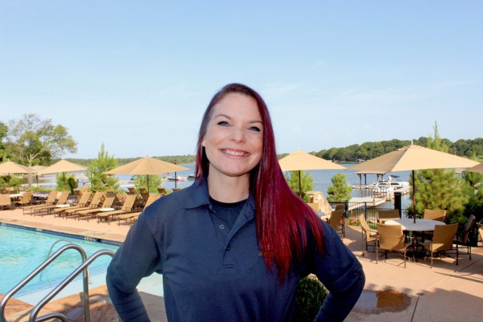 Woman smiling for a spotlight on regatta grill