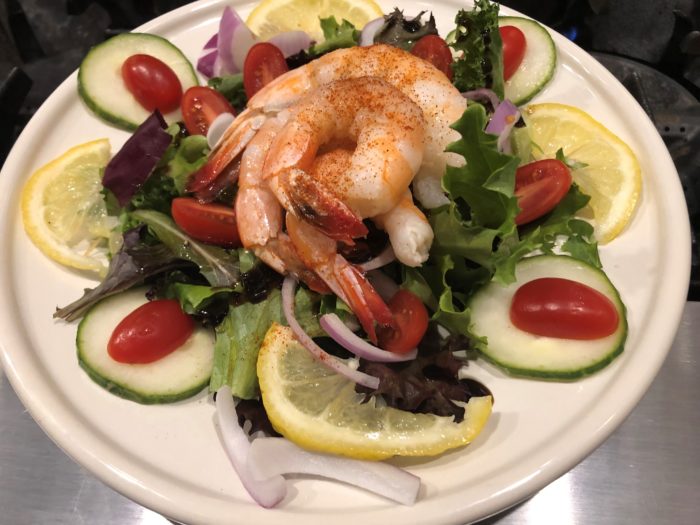Huge shrimp on a salad served up by Mister Sweet Tooth